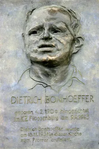 A metal plaque with a portrait of German priest Dietrich Bonhoeffer is on display at the St. Matthaeus Church in Berlin, Feb. 4, 2006. The plaque by artist Johannes Gruetzke reminds the ordination of Bonhoeffer at the church on Nov. 15, 1931. (AP Photo/Markus Schreiber, File)