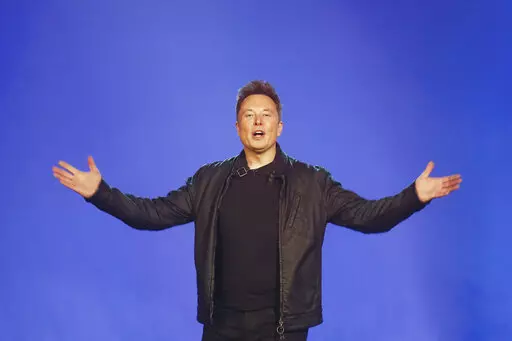 Tesla CEO Elon Musk introduces the Cybertruck at Tesla's design studio Thursday, Nov. 21, 2019, in Hawthorne, Calif. Musk has laid out some bold, if still vague, plans for transforming Twitter into a place of “maximum fun!” once he buys the social media platform for $44 billion and takes it private. (AP Photo/Ringo H.W. Chiu, File)