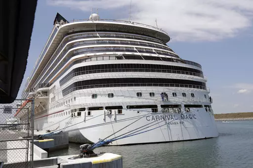 The Carnival cruise line ship Carnival Magic sits docked on April, 2020, in Cape Canaveral, Fla. The U.S. Coast Guard said Tuesday, May 30, 2023, that it's searching for a man who fell from a cruise ship off the coast of Florida. The 35-year-old was on the Carnival Magic when he fell from the ship about 186 miles east of Jacksonville, Fla., on Monday, May 29. (AP Photo/John Raoux, File)
