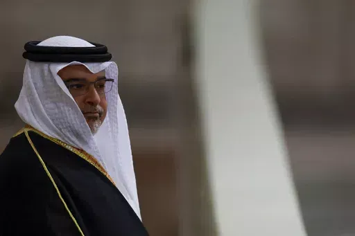 Bahrain's Crown Prince and Prime Minister Salman bin Hamad Al Khalifa pays his respects to the coffin of Britain's Queen Elizabeth, following her death, during her lying-in-state at Westminster Hall, in London, Sunday Sept. 18, 2022. The websites of two government ministries in Bahrain briefly became inaccessible Tuesday, Nov. 21, 2023, after a statement claimed hackers took them down over the island kingdom's stance on the ongoing Israel-Hamas war.(John Sibley/Pool via AP, File)