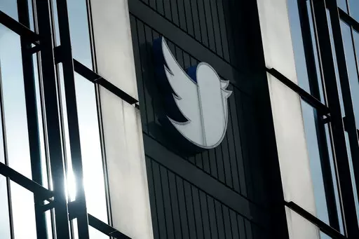 A Twitter logo hangs outside the company's offices in San Francisco, on Dec. 19, 2022. Twitter experienced a bevy of glitches Monday, March 6, 2023 as links stopped working, some users were unable to log in and images were not loading for others. (AP Photo/Jeff Chiu, File)