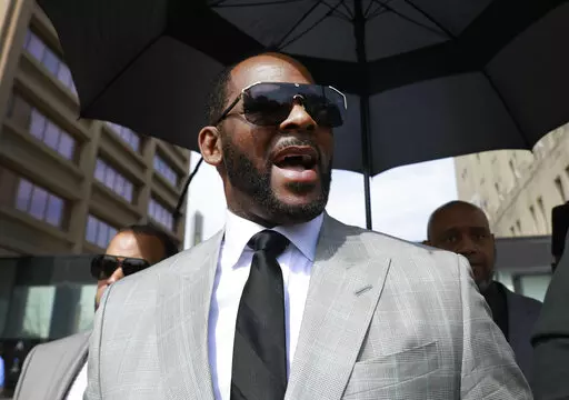 Musician R. Kelly leaves the Leighton Criminal Court building in Chicago on June 6, 2019. Kelly’s federal trial starts Monday in Chicago. (AP Photo/Amr Alfiky, File)