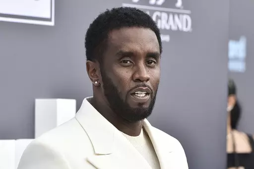 Music mogul and entrepreneur Sean "Diddy" Combs arrives at the Billboard Music Awards, May 15, 2022, in Las Vegas. Two properties belonging to Combs’ in Los Angeles and Miami were searched Monday, March 25, 2024, by federal Homeland Security Investigations agents and other law enforcement as part of an ongoing sex trafficking investigation, two law enforcement officials told The Associated Press. (Photo by Jordan Strauss/Invision/AP, File)