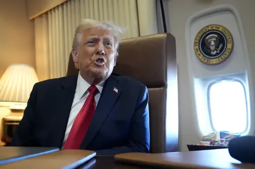 President Donald Trump speaks to reporters aboard Air Force One where Trump signed a proclamation declaring Feb. 9 "the first ever Gulf of America Day," as he travels from West Palm Beach, Fla. to New Orleans, Sunday, Feb. 9, 2025. (AP Photo/Ben Curtis)