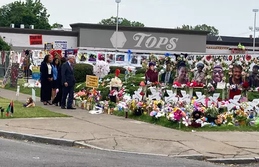 Attorney General Merrick Garland. visits the Tops Friendly Market grocery store in Buffalo, N.Y., on Wednesday, June 15, 2022, the site of a May 14 mass shooting in which 10 Black people were killed.  Garland was in Buffalo to announce federal hate crime charges against the 18-year-old shooter, Payton Gendron.  (AP Photo/Carolyn Thompson)