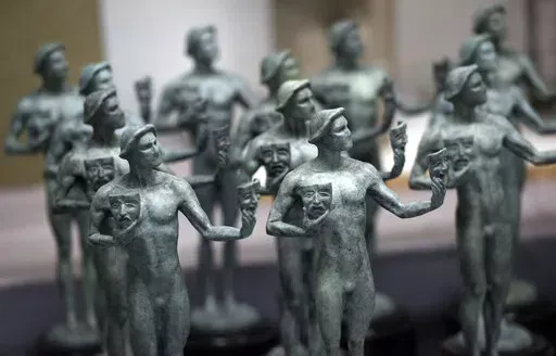 Finished solid bronze Actor statuettes are displayed during the 25th Annual Casting of the Screen Actors Guild Awards at American Fine Arts Foundry, Tuesday, Jan. 15, 2019, in Burbank, Calif.  The 2022 SAG Awards are scheduled to take place on Feb. 27. (Photo by Chris Pizzello/Invision/AP, File)