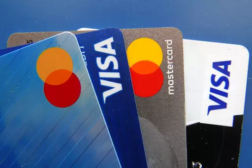 Credit cards as seen Thursday, July 1, 2021, in Orlando, Fla.  Getting and maintaining good credit can feel like a long, hard journey. It’s not always easy to understand why your score changes. Start by checking your credit reports — you’re entitled to get them for free — and disputing errors if you find them.  (AP Photo/John Raoux, File)