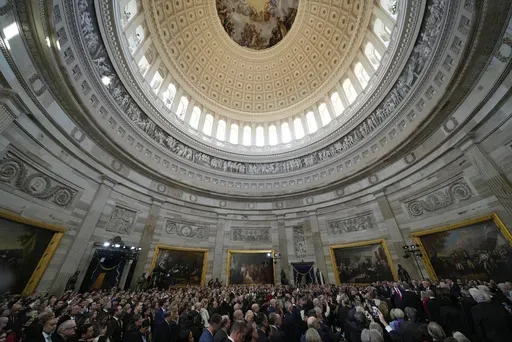 JD Vance is sworn in as vice president by Supreme Court Justice Brett Kavanaugh as Usha Vance holds the Bible during the 60th Presidential Inauguration in the Rotunda of the U.S. Capitol in Washington, Monday, Jan. 20, 2025. (AP Photo/Julia Demaree Nikhinson, Pool)
