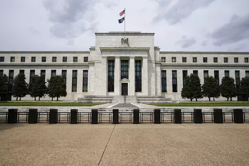 In this May 4, 2021 file photo is the Federal Reserve in Washington. Americans' financial health reached its highest level in nearly a decade last year, the Federal Reserve said Monday, May 23, 2022 spurred by a strong job market and government support payments. (AP Photo/Patrick Semansky, File)