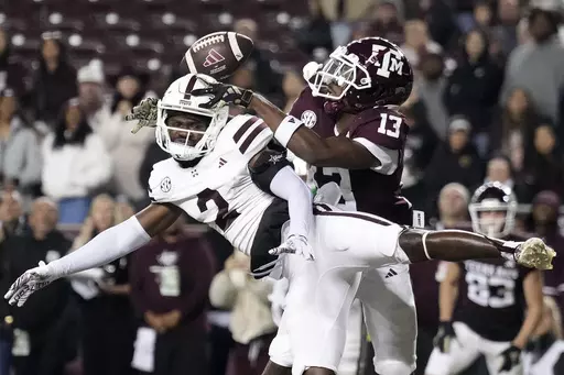 Mississippi State cornerback Esaias Furdge (2) breaks up a pass intended for Texas A&M wide receiver Micah Tease (13) in the end zone during the fourth quarter of an NCAA college football game Saturday, Nov. 11, 2023, in College Station, Texas. (AP Photo/Sam Craft)