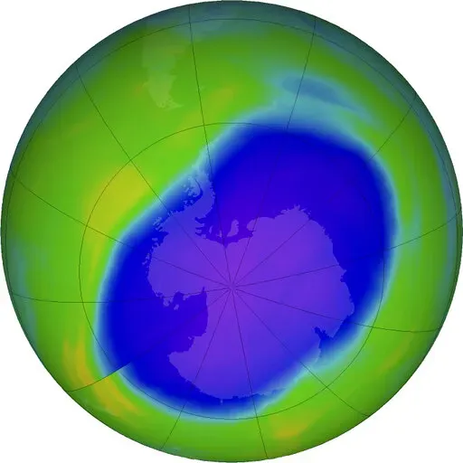 In this NASA false-color image, the blue and purple shows the hole in Earth's protective ozone layer over Antarctica on Oct. 5, 2022. Earth’s protective ozone layer is slowly but noticeably healing at a pace that would fully mend the hole over Antarctica in about 43 years, a new United Nations report says. (NASA via AP, File)