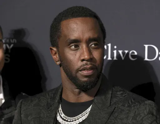 Sean Combs arrives at the Pre-Grammy Gala And Salute To Industry Icons at the Beverly Hilton Hotel on Saturday, Jan. 25, 2020, in Beverly Hills, Calif. (Photo by Mark Von Holden/Invision/AP, File)