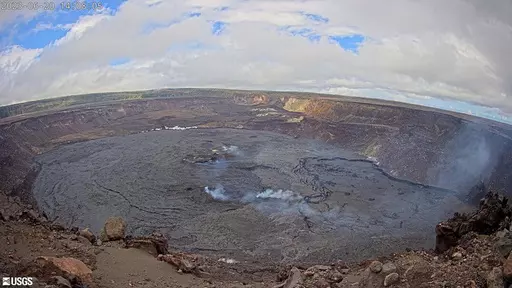 This webcam image provided by the U.S. Geological Survey shows the summit of the Kilauea volcano in Hawaii, Tuesday, June 20, 2023. An eruption of the Hawaii volcano that began nearly two weeks earlier has come to a pause, scientists said. Kilauea, one of the most active volcanoes in the world, began erupting June 7 after a three-month pause, displaying fountains of glowing red lava without threatening any communities or structures. (U.S. Geological Survey via AP)