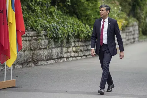 British Prime Minister Rishi Sunak arrives at the Ukraine peace summit in Obbürgen, Switzerland, Saturday, June 15, 2024. Switzerland is hosting scores of world leaders this weekend to try to map out the first steps toward peace in Ukraine. (AP Photo/Laurent Cipriani)