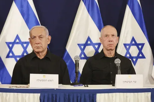 Israeli Prime Minister Benjamin Netanyahu, left, and Defense Minister Yoav Gallant attend a press conference in the Kirya military base in Tel Aviv, Israel, Saturday, Oct. 28, 2023. (Abir Sultan/Pool Photo via AP, File)