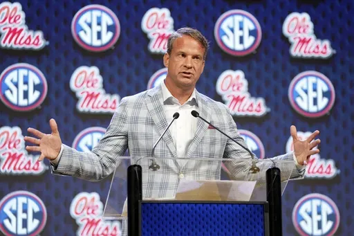 Ole Miss head football coach Lane Kiffin speaks during the Southeastern Conference NCAA college football media days Monday, July 15, 2024, in Dallas. (AP Photo/Jeffrey McWhorter)