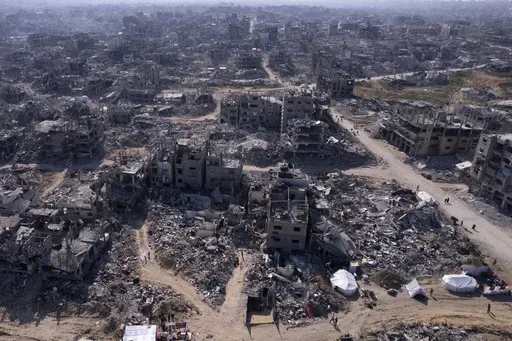 An aerial photograph taken by a drone shows the destruction caused by the Israeli air and ground offensive in Jabaliya, Gaza Strip, Wednesday, Jan. 29, 2025. (AP Photo/Mohammad Abu Samra)
