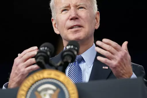 President Joe Biden speaks about status of the country's fight against COVID-19 in the South Court Auditorium on the White House campus, March 30, 2022, in Washington. President Joe Biden is ordering a new national research push on long COVID, while also directing federal agencies to support patients dealing with the mysterious and debilitating condition. The White House said Tuesday that Biden is ordering the Department of Health and Human Services to coordinate an urgent new initiative across 