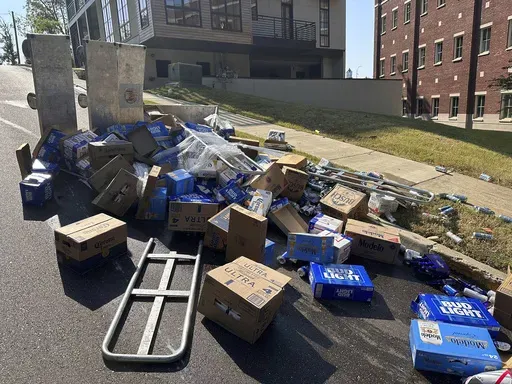 CORRECTS STATE TO MISS. NOT MASS. This image provided by the Oxford Police Department shows a street closed due to an 18 wheeler losing part of its load, Wednesday, Aug. 21, 2024 in Oxford, Miss. (Oxford Police Department via AP)