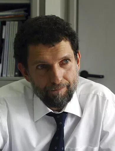 Osman Kavala, a Turkish philanthropist businessman and human rights defender poses for a photo in Istanbul, Turkey, April 29, 2015. A Turkish Court on Monday April 25, 2022, sentenced prominent Turkish civil rights activist and philanthropist Osman Kavala to life in prison without parole, finding him guilty of attempting to overthrow the government in connection with the 2013 mass anti-government protests. (AP Photo/File)