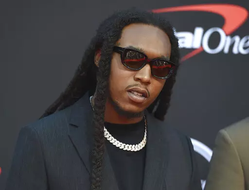 Takeoff arrives at the ESPY Awards in Los Angeles on July 10, 2019. On Friday, Dec. 2, 2022, police announced that they have arrested a 33-year-old man in connection with the fatal shooting of rapper Takeoff, who was killed last month outside a bowling alley in Houston. (Photo by Jordan Strauss/Invision/AP, File)