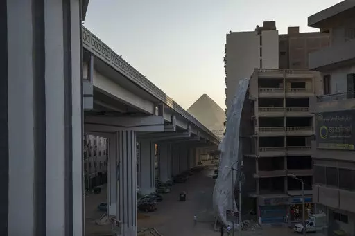A bridge under construction is part of mega projects that include building new cities, roads, bridges and tunnels as the government tries to ease traffic on congested roads in one of the world's most crowded cities, in the Giza suburb of Cairo, Egypt, July 19, 2021. The massive road construction projects have erased some of the oldest remaining green spaces in Egypt’s capital. (AP Photo/Nariman El-Mofty, File)
