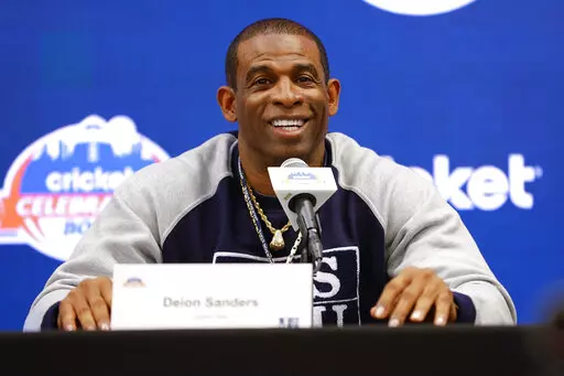 Deion Sanders speaks during a news conference for the Celebration Bowl NCAA college football game between North Carolina Central and Jackson State, Friday, Dec. 16, 2022 in Atlanta. Jackson State is looking to wrap up its first undefeated season in its final game under coach Deion Sanders, who has been hired as Colorado's coach. (AP Photo/Todd Kirkland)