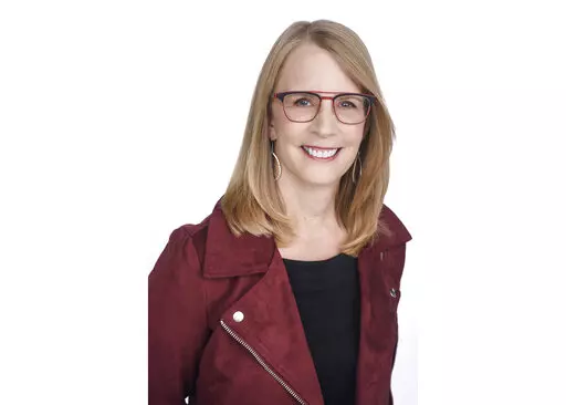 This undated file photo provided by NerdWallet shows Liz Weston, a columnist for personal finance website NerdWallet.com. House prices are soaring, and homeowners have a lot of value built up between what’s left on the mortgage and what their house is worth. Still, there are reasons to pause before cashing out that equity. (NerdWallet via AP, File)