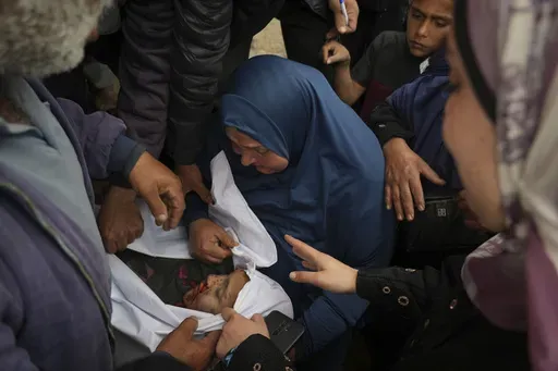 Awatif Sabbah mourns her daughter, Jana,10, killed by an Israeli airstrike, at the hospital in Deir al-Balah, Gaza Strip, on Tuesday, April 8, 2025. (AP Photo/Abdel Kareem Hana)