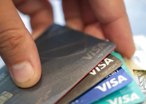 This Aug. 11, 2019 file photo shows Visa credit cards in New Orleans. Credit limits aren’t always there when you need them. With a potential recession looming, it’s important to understand how issuers treat credit limits in an unstable economy.  (AP Photo/Jenny Kane, File)