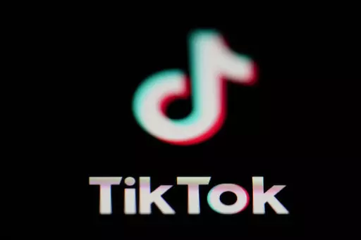 The icon for the video sharing TikTok app is seen on a smartphone, on Feb. 28, 2023. European regulators slapped TikTok with a $368 million fine on Friday, Sept. 15, 2023, for failing to protect children's privacy, the first time that the popular short video-sharing app has been punished for breaching Europe's strict data privacy rules. (AP Photo/Matt Slocum, File)