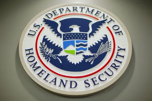 The Department of Homeland Security logo is seen during a news conference in Washington, Feb. 25, 2015. (AP Photo/Pablo Martinez Monsivais, File)