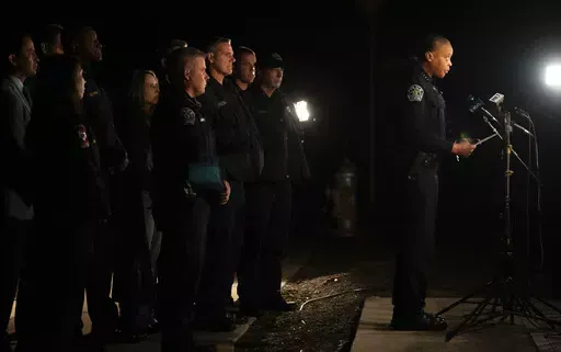 Austin Interim Police Chief Robin Henderson speaks at a media briefing in Austin, Texas early Wednesday Dec. 6, 2023. Texas authorities say a daylong series of attacks in Austin has left four people dead and at least three injured, and a man believed to be connected to them and the deaths of two people near San Antonio was taken into custody. (Sara Diggins /Austin American-Statesman via AP)