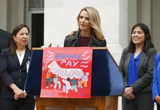 California first partner Jennifer Siebel Newsom, center, wife of Gov. Gavin Newsom, joined others to announce the #EqualPayCA campaign, in Sacramento, Calif., on April 1, 2019. Siebel Newsom, a documentary filmmaker and actor, is among the accusers of Harvey Weinstein who will testify at his rape and sexual assault trial that began Monday, Oct. 10, 2022, her attorney said.  (AP Photo/Rich Pedroncelli, File)