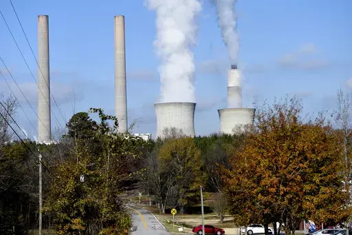 Plant Bowen, commonly known as Bowen Steam Plant, is a Coal power station, operating, Monday, Dec. 14, 2020, in Euharlee, Ga. The Georgia Public Service Commission approved a deal on Tuesday, April 16, 2024 that allows the company to contract for or build additional generation capacity. (AP Photo/Mike Stewart, File)