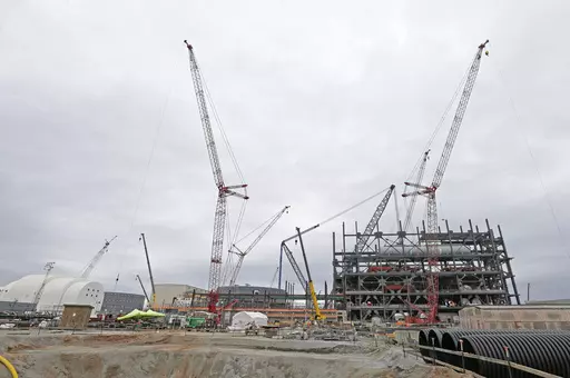 Construction is seen on two new nuclear reactors at the V.C. Summer Nuclear Station during a media tour in Jenkinsville, S.C., on Sept. 21, 2016. The owners abandoned the South Carolina reactors in 2017 after contractor Westinghouse Electric Co. declared bankruptcy, while construction continued on two new reactors in Georgia. (AP Photo/Chuck Burton, File)
