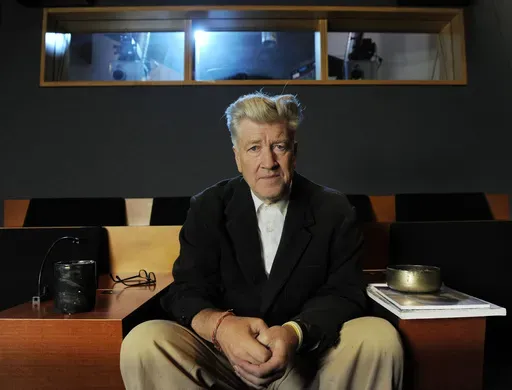 Filmmaker David Lynch poses for a portrait in his private screening room in Los Angeles on Sept. 9, 2010. (AP Photo/Chris Pizzello, file)