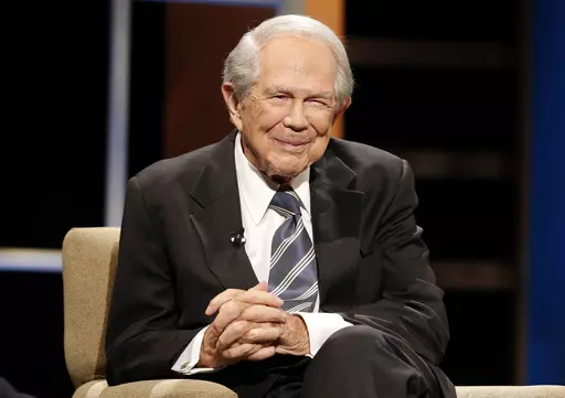 Rev. Pat Robertson poses a question to a Republican presidential candidate during a forum at Regent University in Virginia Beach, Va., Oct. 23, 2015. Robertson, a religious broadcaster who turned a tiny Virginia station into the global Christian Broadcasting Network, tried a run for president and helped make religion central to Republican Party politics in America through his Christian Coalition, has died. He was 93. Robertson's death Thursday, June 8, 2023 was announced by his broadcasting netw