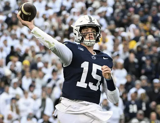 Penn State quarterback Drew Allar passes against Michigan during the second half of an NCAA college football game Nov. 11, 2023, in State College, Pa. Mississippi will play for the first 11-win season in school history when the Rebels of the Southeastern Conference, led by quarterback Jaxson Dart, face Penn State, led by Allar, in the Peach Bowl, Saturday, Dec. 30, 2023. (AP Photo/Barry Reeger, File)