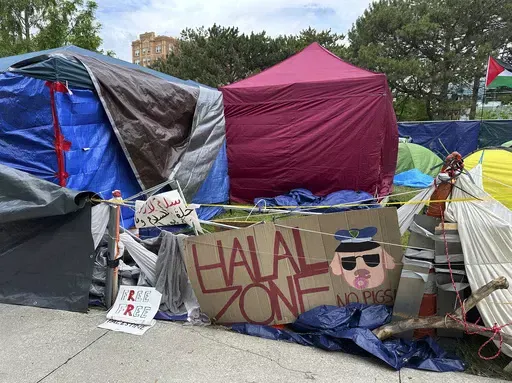 A pro-Palestinian encampment is shown Tuesday, May 28, 2024, on the campus of Wayne State University in Detroit. The school suspended in-person classes and encouraged staff to work remotely to avoid any problems with the encampment. (AP Photo/Mike Householder)