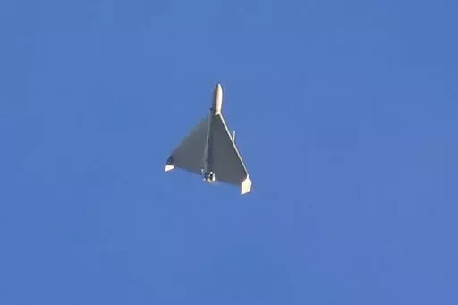 A drone is seen in the sky seconds before it fired on buildings in Kyiv, Ukraine, on Oct. 17, 2022. The Iranian-made drones that Russia sent slamming into central Kyiv this week have produced hand-wringing and consternation in Israel, complicating the country’s balancing act between Russia and the West. (AP Photo/Efrem Lukatsky)