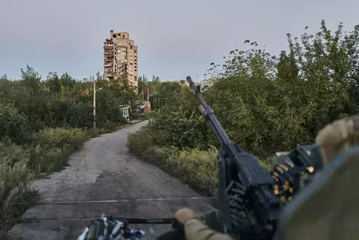 A Ukrainian soldier sits in his position in Avdiivka, Donetsk region, Ukraine, on Aug. 18, 2023. (AP Photo/Libkos, File)