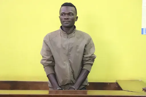Collins Jumaisi Khalusha, a prime suspect of killing and dismembering women then dumping them in a flooded quarry, appears in court in Nairobi, Kenya, on July 16, 2024. (AP Photo/Andrew Kasuku, File)