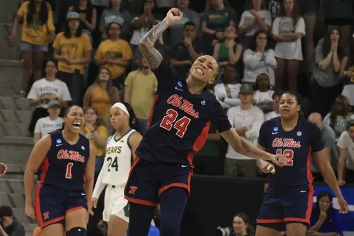 Mississippi guard Madison Scott reacts after scoring against Baylor during the second half in the second round of the NCAA college basketball tournament, Sunday, March 23, 2025, in Waco, Texas. (AP Photo/Jerry Larson)