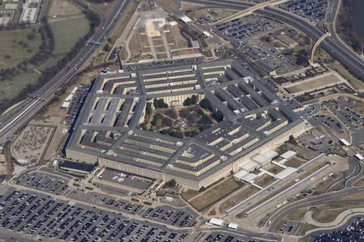 The Pentagon is seen from Air Force One as it flies over Washington, March 2, 2022. A fake image purportedly showing an explosion near the Pentagon has been widely shared on social media, sending a brief shiver through the stock market. But police and fire officials in Arlington, Va., said Monday, May 22, 2023, that the image isn't real and there was no incident at the U.S. Department of Defense headquarters. (AP Photo/Patrick Semansky, File)