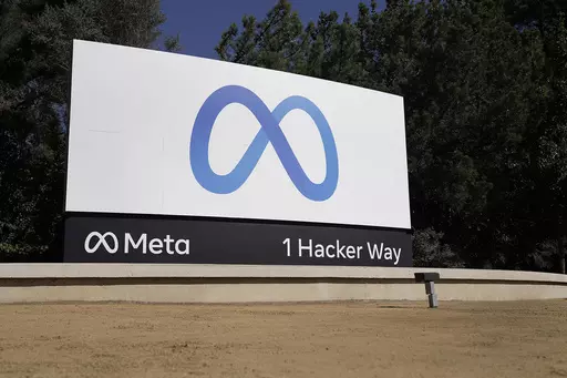 Facebook's Meta logo sign is seen at the company headquarters in Menlo Park, Calif., on, Oct. 28, 2021. Anyone in the U.S. who has had a Facebook account at any time since May 24, 2007, can now apply for their share of a $725 million privacy settlement that parent company Meta has agreed to pay. Meta is paying to settle a lawsuit alleging the world’s largest social media platform allowed millions of its users’ personal information to be fed to Cambridge Analytica, a firm that supported Donal