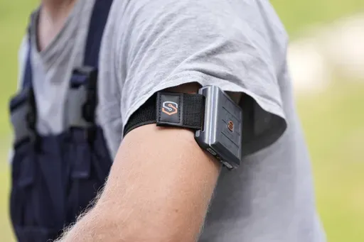 A SlateSafety armband is worn by Wyatt Fischer, a furnace mason employee at Cardinal Glass, Thursday, Aug. 22, 2024, in Menomonie, Wis. (AP Photo/Abbie Parr)