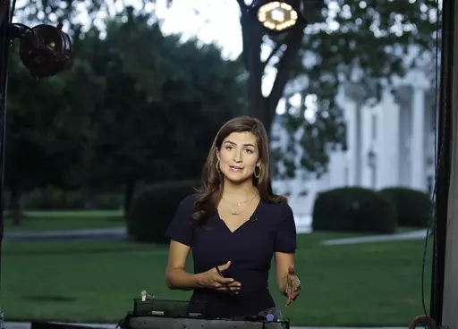 CNN White House correspondent Kaitlan Collins during a live shot in front of the White House in Washington, July 25, 2018. Donald Trump's town hall forum on CNN on Wednesday, May 10, 2023, is the first major TV event of the 2024 presidential campaign, and a big test for the chosen moderator, Kaitlan Collins. The former White House correspondent and now-morning show host must juggle questions from an audience of Republican primary voters, her own follow-ups and the need to fact-check false statem
