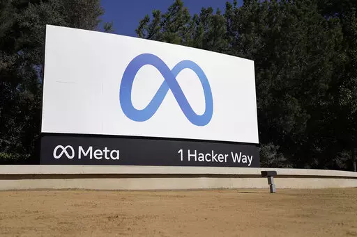 Facebook's Meta logo sign is seen at the company headquarters in Menlo Park, Calif., on, Oct. 28, 2021. Facebook's corporate parent has reached a tentative settlement, Friday, Aug. 26, 2022,  in a lawsuit alleging the world's largest social network service allowed millions of its users' personal information to be fed to Cambridge Analytica, a firm that supported Donald Trump's victorious presidential campaign in 201  (AP Photo/Tony Avelar, File)