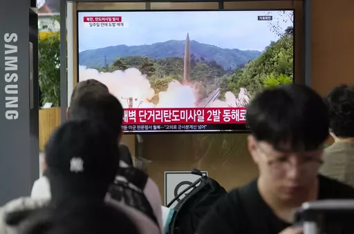 A TV screen shows a file image of North Korea's missile launch during a news program at the Seoul Railway Station in Seoul, South Korea, Wednesday, July 19, 2023. North Korea fired two short-range ballistic missiles into its eastern sea early Wednesday in what appeared to be a statement of defiance as the United States deploys a nuclear-armed submarine to South Korea for the first time in decades. (AP Photo/Ahn Young-joon)